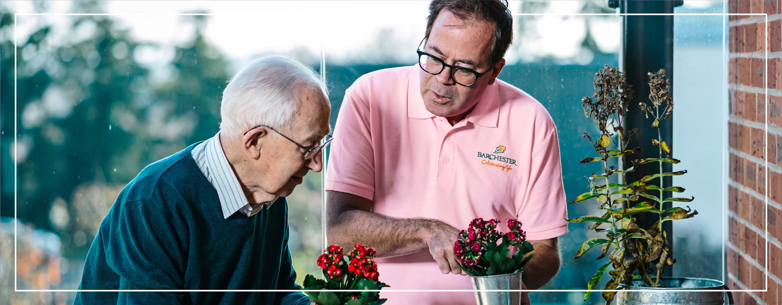 Carer and resident gardening